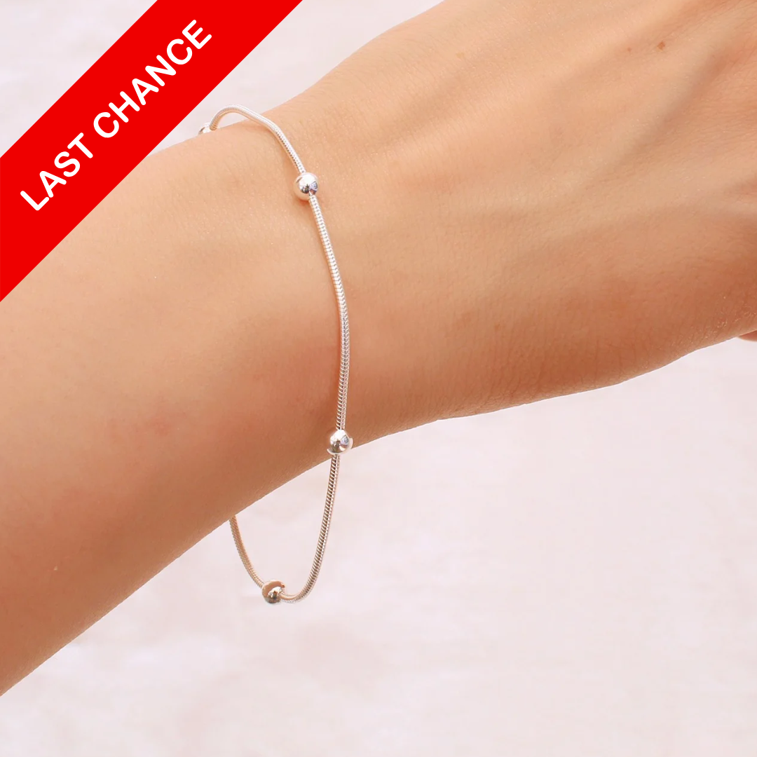 PULSERA CON BALINES